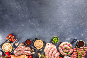 Set of different raw sausages