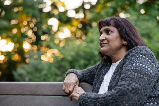 Thoughtful, concerned portrait outside in the evening.