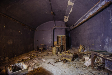 Fototapeta na wymiar Empty abandoned underground hall in bunker