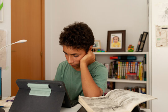 teenager boy doing homework