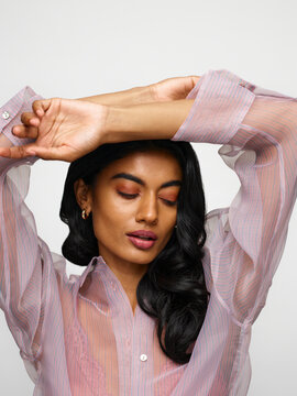 Stylish model wearing golden earrings