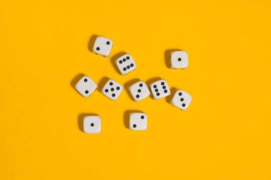 Dices on a yellow background