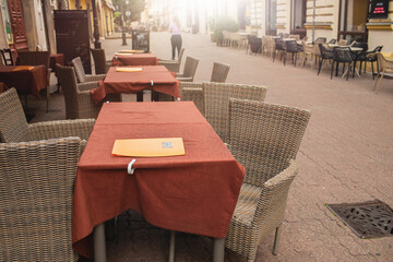 Restaurant outdoor terrace in city centre.Summer season