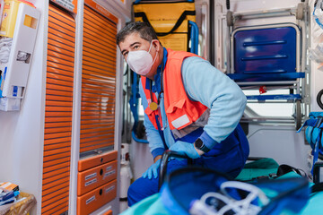 paramedic working inside an ambulance