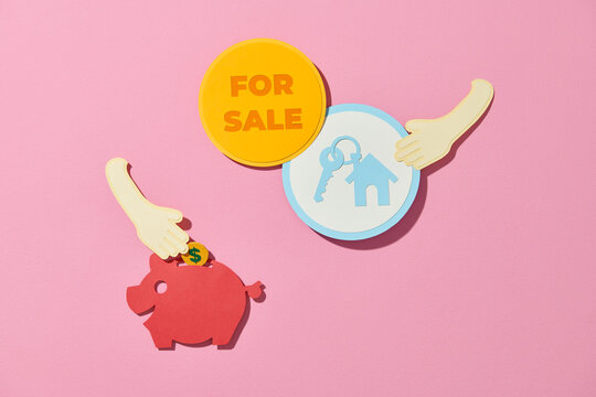 real estate, house model with key and piggy bank on table - Powered by Adobe