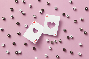 Ace and Queen of Hearts with black and white dice.