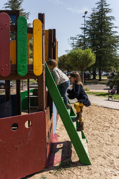 children playing in an outdoor playground