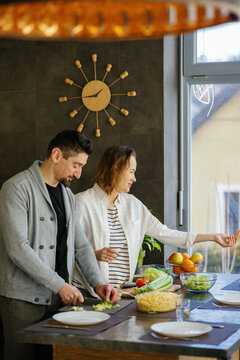 Food preparation. Radiating love. Homey atmosphere. Healthy lunch