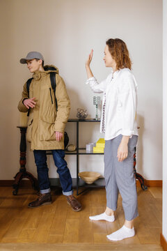 Bid farewell home doorway children parent love