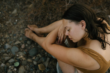 Young woman doing relaxing self care in nature