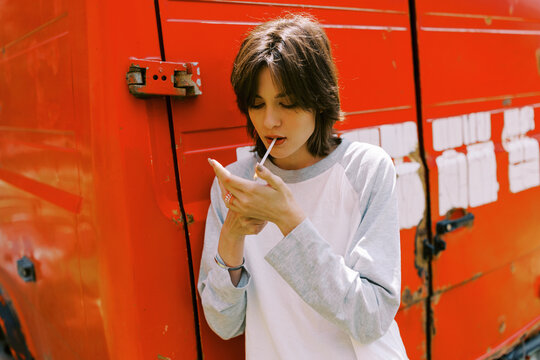 summer female portrait  with cigarette outdoors