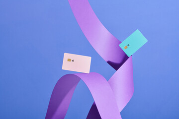 Banks card float on waves of purple color paper with light