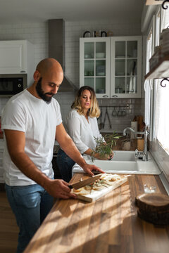 Couple Preparing Dinner At Home