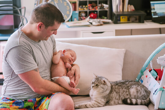 Cat and Baby's First Encounter: Dad Introduces Newborn,