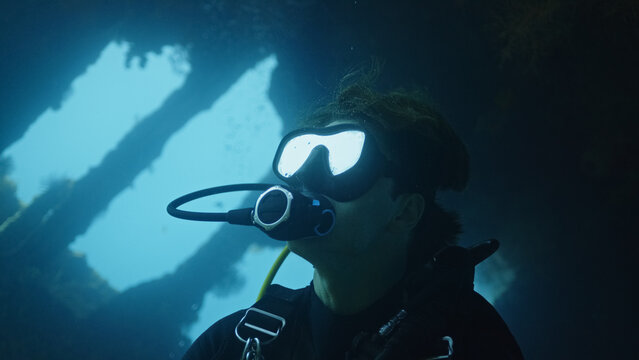 Portrait of a man scuba diver meditative moment