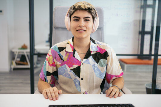 Young non-binary person during a business video call
