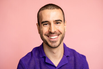 Portrait of a man smiling.