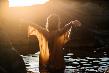 Woman swimming with translucent shirt