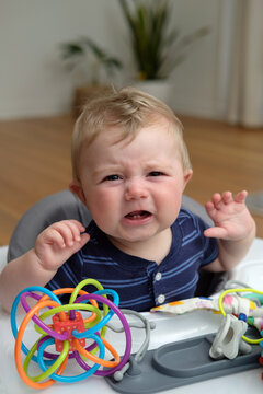 Infant boy upset.