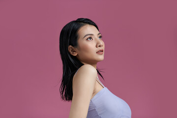 Asian woman has a lovely face is feeling happy with her perfect skin