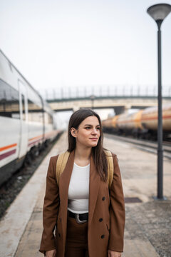 young woman in train station