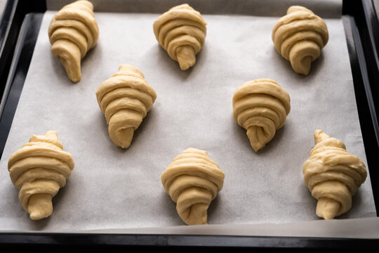 Before and after -homemade croissant baking at home. Side view