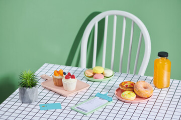 Bakery, credit card, bill of food  with orange juice on table