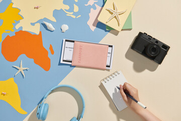 Woman making list for traveling