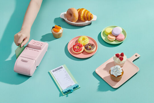 Set of pastry and Tea for Tea Time with bill, credit card and POSm