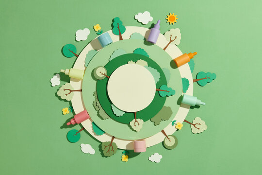 Eco cosmetic branding with colorful bottles on paper background