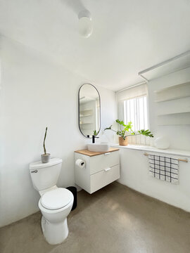 bright white refreshing modern bathroom after renovation