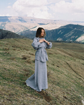 Film portrait of gIrl in front of the mountain range