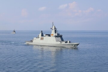 Fototapeta na wymiar Warship on patrol in the sea
