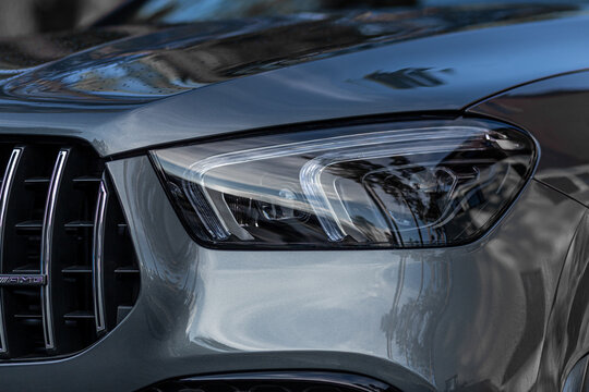  Novosibirsk, Russia - July  21, 2023:  silver Mercedes-Benz GLE Coupe AMG 53 4Matic+ 2023,  Detail light close up of on new car. Exterior detail ..