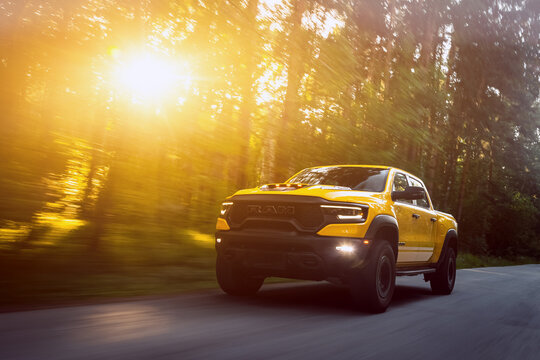  Novosibirsk, Russia - July 27, 2023:  yellow Dodge Ram Trx Havok Edition, pickup  driving  in  park, front view
