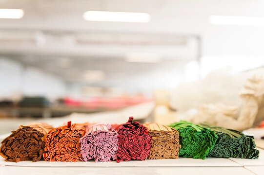 Stored colourful leather strips at factory warehouse