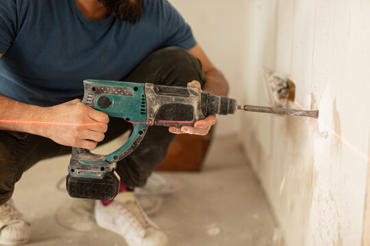 Drilling a hole in the wall using laser precision