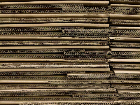 Stack of Cardboard Boxes background in Warehouse shipping Facility