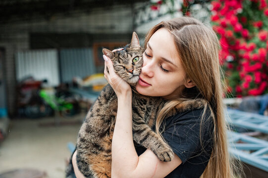 The young woman and her cat