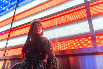 Portrait Of A Fifteenth Birthday Quinceanera With The USA Flag.