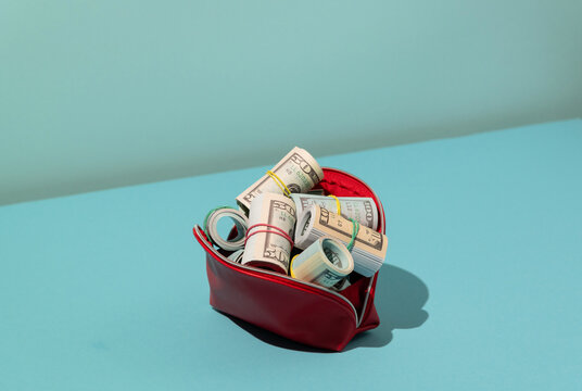 US dollars in red purse, cash, banknotes, money