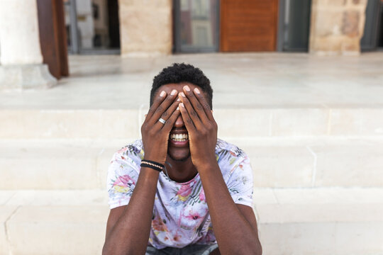Portrait of teenage black boy outdoors