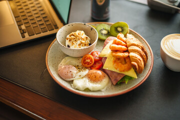 breakfast sandwich croissant ham cheese