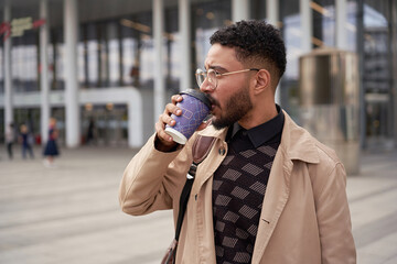 Stylish Man Drinking Coffee On Street