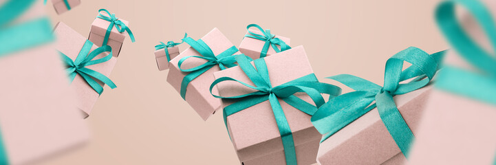 Many Flying Gift Boxes on a light blue background. Holiday concept, gift, sale, wedding and birthday