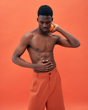 Handsome black young man in sensual pose