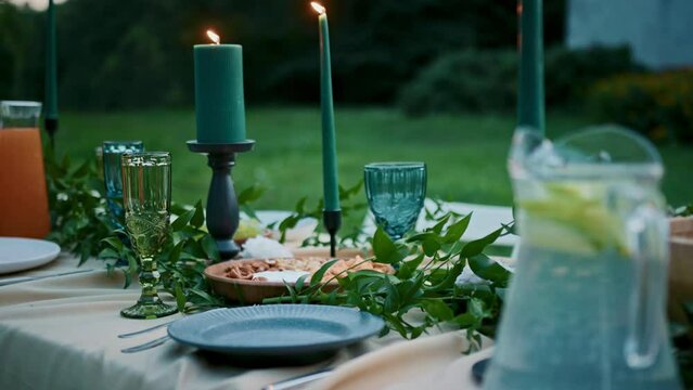 Beautifully laid festive table for an outdoor party