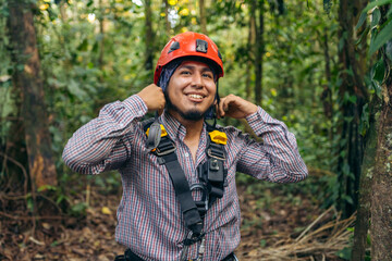 Man with tree climbing equipment