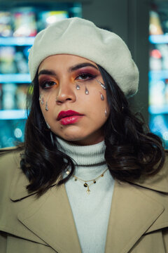 Glitter tears and dramatic makeup