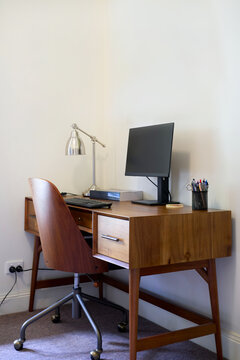 Styled study with timber desk and chair